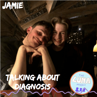 Jamie on the right smiling with his partner Peter on the left 